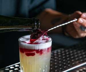 Wine poured over the top of the drink, making it a NY Sour