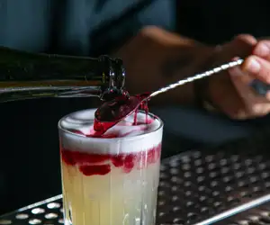 Wine poured over the top of the drink, making it a NY Sour